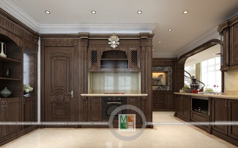 Mẫu tủ bếp gỗ óc chó với tông màu màu nâu trầm mang đến sự sang trọng và đẳng cấp cho không gian căn bếp gia đình bạn