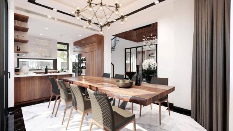 Ngoài điểm đặc biệt từ cách bố trí kệ trang trí, bàn đảo bằng đá nhân tạo màu trắng được thiết kế nhô ra ngoài lại là điểm đáng chú ý, một mặt vẫn đảm bảo diện tích để chủ nhân có thể phô diễn món ăn thỏa mái, một mặt bạn lại có thể vừa nội trợ vừa có thể để mắt con học một cách dễ dàng.